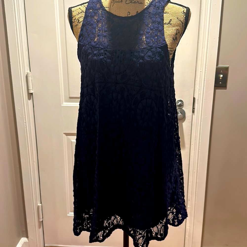 Free People Navy lace swing mini dress with mesh racer back. Size XS